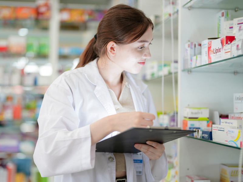 A pharmacist checks stock