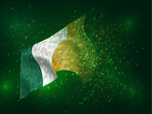 The flag of Ireland against a green backgroup